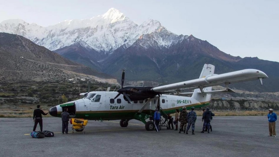 The Canadian-built plane was flying from the city of Pokhara to Jomsom, a popular tourist town in central Nepal. The Canadian-built plane was flying from the city of Pokhara to Jomsom, a popular tourist town in central Nepal.