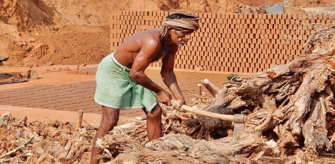 On the construction site, labourers scale up walls, lay concrete and carry heavy loads, using ragged scarves around their heads as protection against the sun. On the construction site, labourers scale up walls, lay concrete and carry heavy loads, using ragged scarves around their heads as protection against the sun.