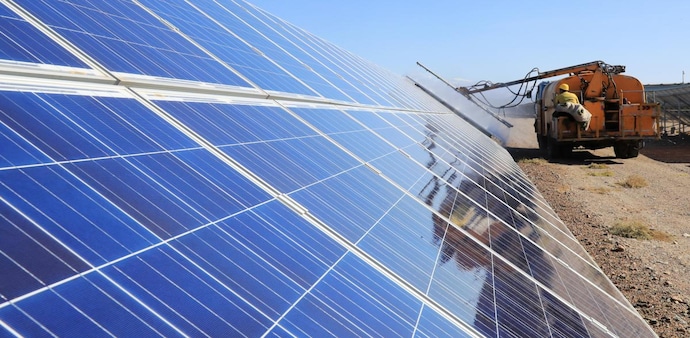 Tata Motors, Tata Power team up to build a solar rooftop expansion project in Pune (Photo: Reuters) Tata Motors, Tata Power team up to build a solar rooftop expansion project in Pune (Photo: Reuters)