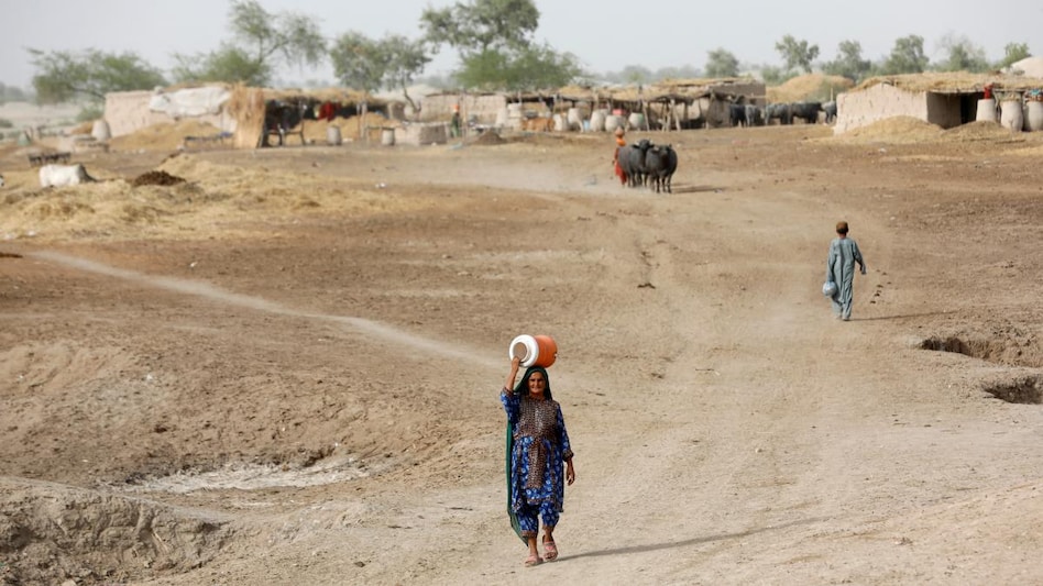 These women in southern Pakistan and millions like them around the world are at the searing edge of climate change. These women in southern Pakistan and millions like them around the world are at the searing edge of climate change.