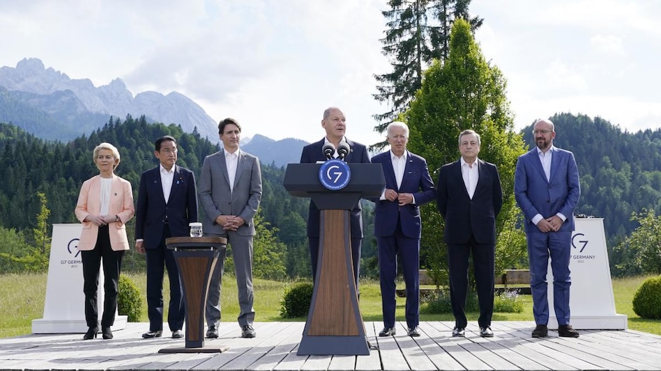 German Chancellor Olaf Scholz with from left, Ursula von der Leyen, Fumio Kishida, Justin Trudeau, Joe Biden, Mario Draghi, and Charles Michel. German Chancellor Olaf Scholz with from left, Ursula von der Leyen, Fumio Kishida, Justin Trudeau, Joe Biden, Mario Draghi, and Charles Michel.