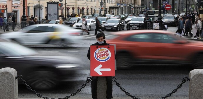 A Burger King promoter works at Nevsky Avenue in Saint Petersburg, Russia April 24, 2022 A Burger King promoter works at Nevsky Avenue in Saint Petersburg, Russia April 24, 2022