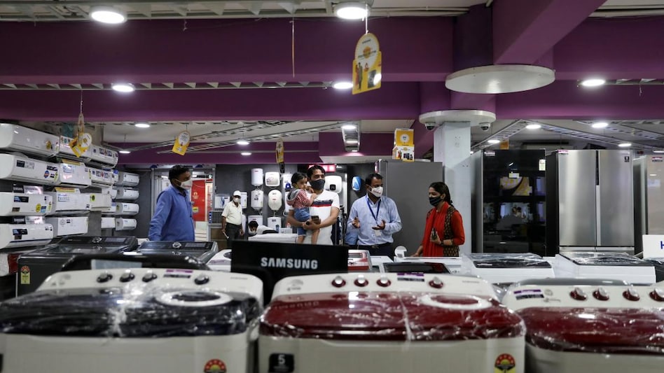 A customer with his family is seen at an electronics and appliances shop in Jaipur, India, October 20, 2020. Picture taken October 20, 2020. (Photo: Reuters) A customer with his family is seen at an electronics and appliances shop in Jaipur, India, October 20, 2020. Picture taken October 20, 2020. (Photo: Reuters)