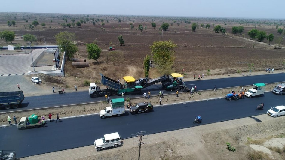 NHAI enters Guinness World Records, lays 75 km highway in under 5 days (Source: ANI) NHAI enters Guinness World Records, lays 75 km highway in under 5 days (Source: ANI)