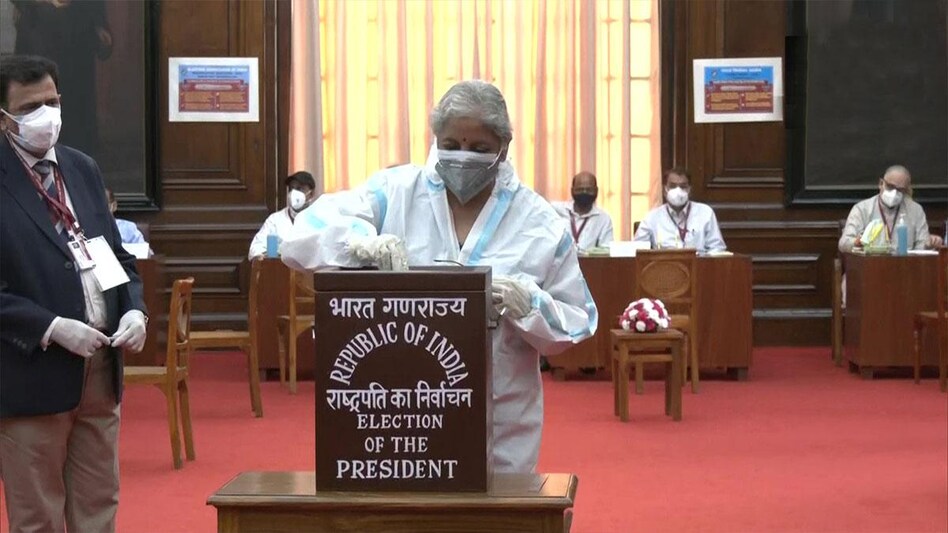 FM casts vote for Presidential election in PPE kit after testing positive for COVID (Photo: ANI) FM casts vote for Presidential election in PPE kit after testing positive for COVID (Photo: ANI)