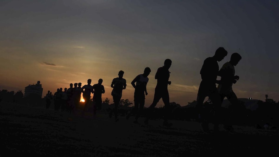Youngsters run during a training session organised for the preparation of Agnipath examination, at Gandhi Maidan in Patna. Youngsters run during a training session organised for the preparation of Agnipath examination, at Gandhi Maidan in Patna.