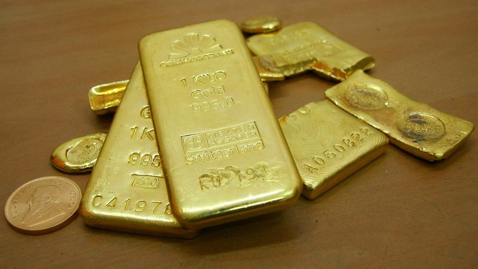 Gold jumps Rs 594 per 10 gms; silver rallies Rs 998 per kg (Photo: Reuters) Gold jumps Rs 594 per 10 gms; silver rallies Rs 998 per kg (Photo: Reuters)