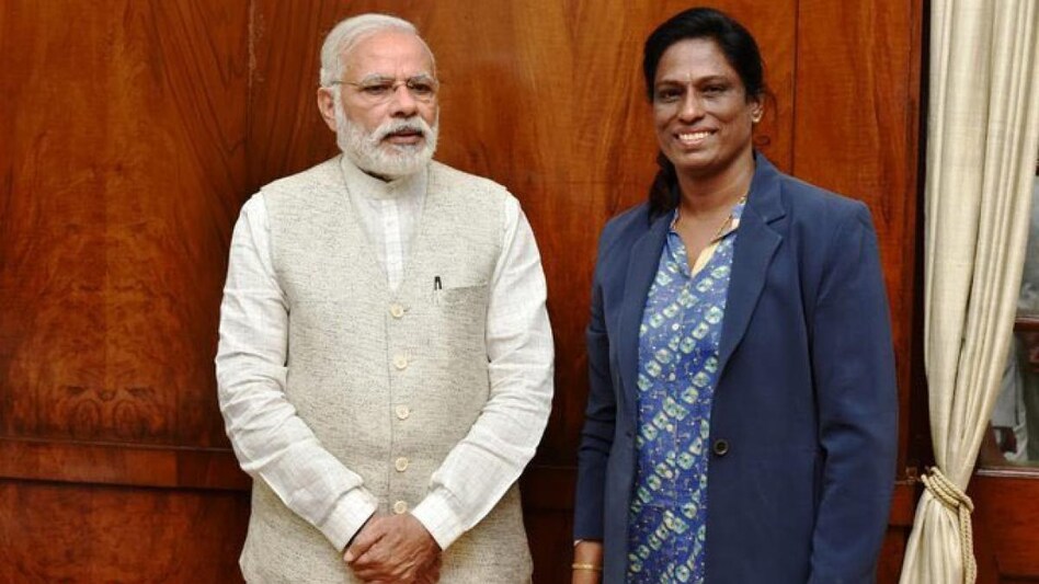 FILE PHOTO: PM Narendra Modi with celebrated athlete PT Usha FILE PHOTO: PM Narendra Modi with celebrated athlete PT Usha