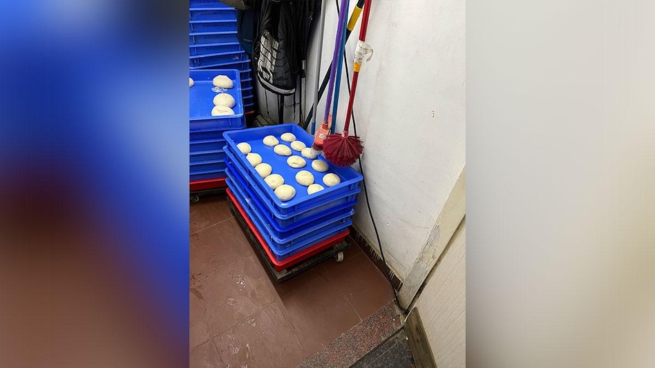 Domino’s face Twitterati ire after picture, video of pizza dough under mop and toilet brush goes viral (Photo: Sahil Karnany Twitter handle) Domino’s face Twitterati ire after picture, video of pizza dough under mop and toilet brush goes viral (Photo: Sahil Karnany Twitter handle)