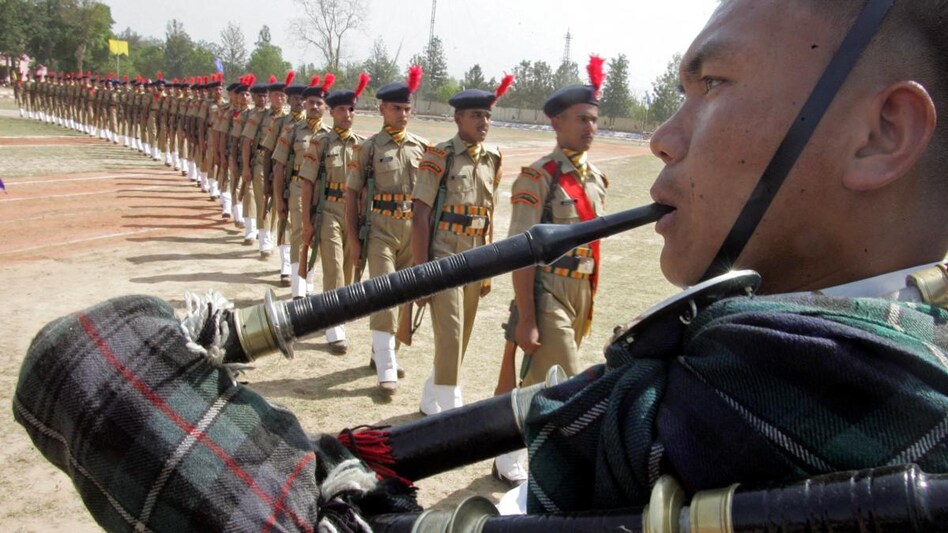 A band member from the Gurkha regiment of Indian Army plays a musical instrument during the passing out parade ceremony of Indo-Tibetan Border Police A band member from the Gurkha regiment of Indian Army plays a musical instrument during the passing out parade ceremony of Indo-Tibetan Border Police