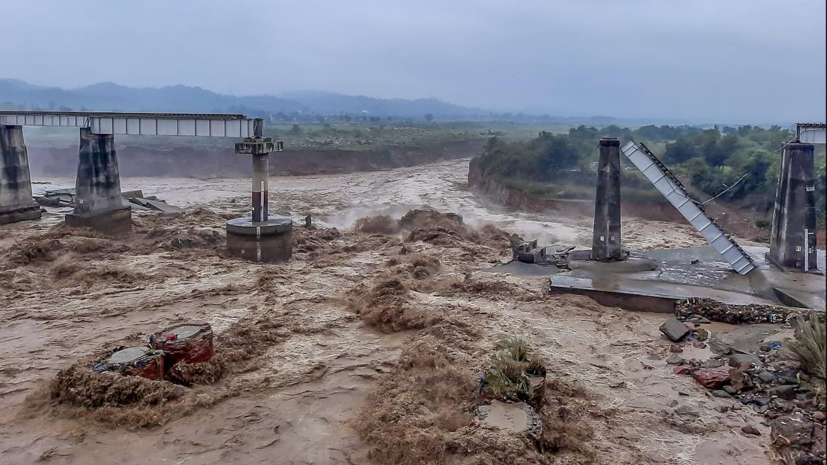 Collapsed portion of railway bridge over the Chakki river after flash flood triggered by heavy monsoon rains Collapsed portion of railway bridge over the Chakki river after flash flood triggered by heavy monsoon rains