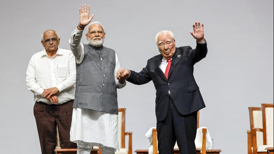 Prime Minister Narendra Modi and Suzuki Motor Corporation CEO Osamu Suzuki during the foundation stone laying ceremony of Suzuki EV battery plant and Maruti Suzuki vehicle manufacturing facility, in Gandhinagar Prime Minister Narendra Modi and Suzuki Motor Corporation CEO Osamu Suzuki during the foundation stone laying ceremony of Suzuki EV battery plant and Maruti Suzuki vehicle manufacturing facility, in Gandhinagar