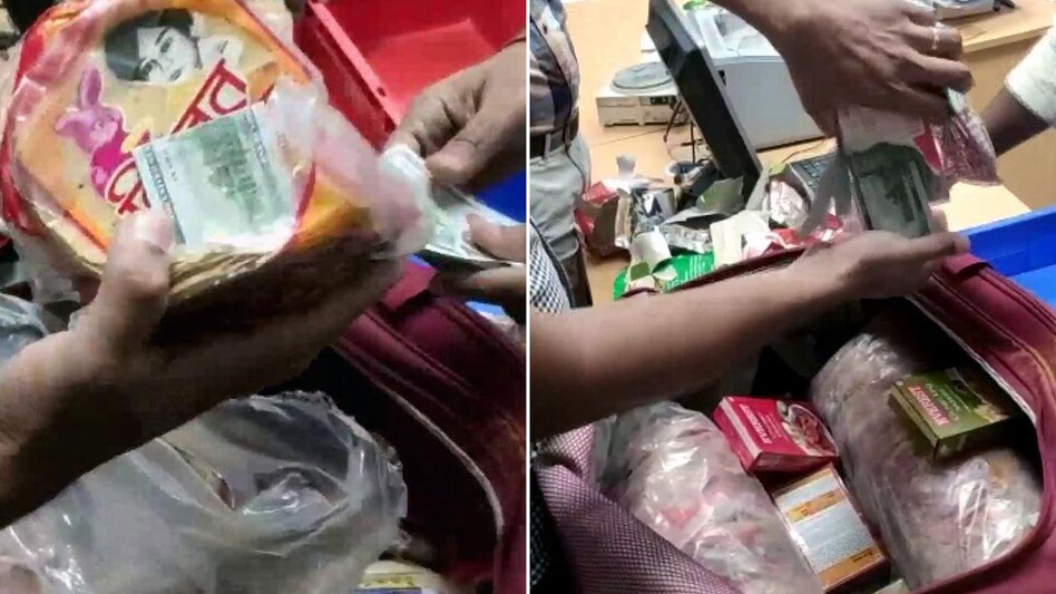 Man caught hiding Rs 15 lakh in papad packets, spice boxes at Delhi airport Man caught hiding Rs 15 lakh in papad packets, spice boxes at Delhi airport
