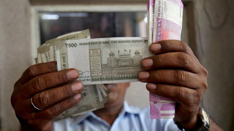 Indian rupee opens lower on hawkish Fed outlook (Photo: Reuters) Indian rupee opens lower on hawkish Fed outlook (Photo: Reuters)