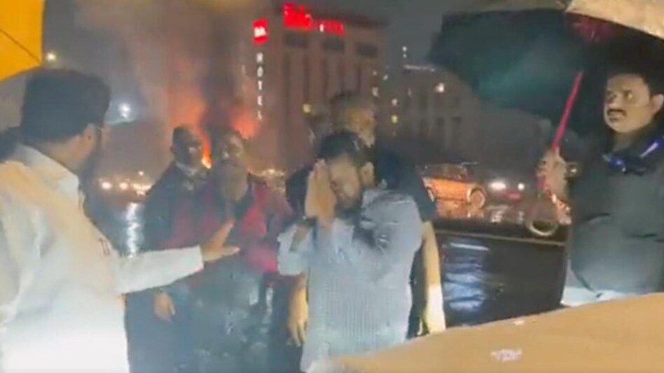 In the video of the incident, Shinde is seen consoling the vehicle’s owner Vikrant Shinde. In the video of the incident, Shinde is seen consoling the vehicle’s owner Vikrant Shinde.