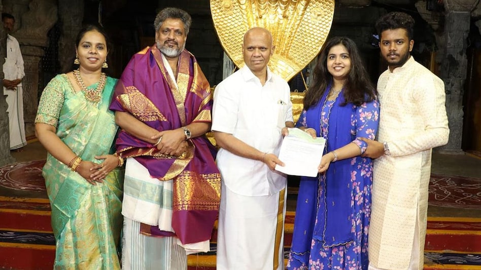 Subeena Banu and Abdul Ghani handed over the check to the Tirumala Tirupati Devasthanam (TTD) trust, which manages the temple. (Photo: ANI) Subeena Banu and Abdul Ghani handed over the check to the Tirumala Tirupati Devasthanam (TTD) trust, which manages the temple. (Photo: ANI)