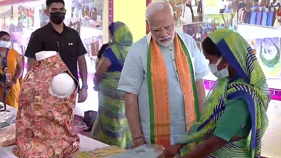 Prime Minister Narendra Modi inspects an exhibition by Self Help Groups (SHGs) in Karahal, Sheopur. Prime Minister Narendra Modi inspects an exhibition by Self Help Groups (SHGs) in Karahal, Sheopur.