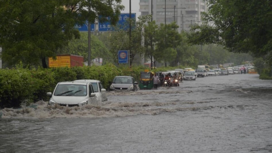 Delhi rain news: Delhi Police helpline received 23 calls regarding traffic jams and seven related to waterlogging and two regarding uprooting of trees. Delhi rain news: Delhi Police helpline received 23 calls regarding traffic jams and seven related to waterlogging and two regarding uprooting of trees.