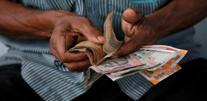 Rupee falls by 42 paise to 81.82 against dollar on spike in crude oil (Photo: Reuters) Rupee falls by 42 paise to 81.82 against dollar on spike in crude oil (Photo: Reuters)