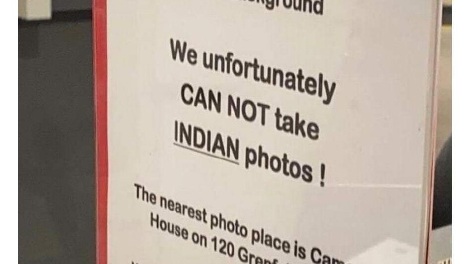 The poorly worded notice was meant to communicate that it couldn’t take photos for Indian passports. The poorly worded notice was meant to communicate that it couldn’t take photos for Indian passports.