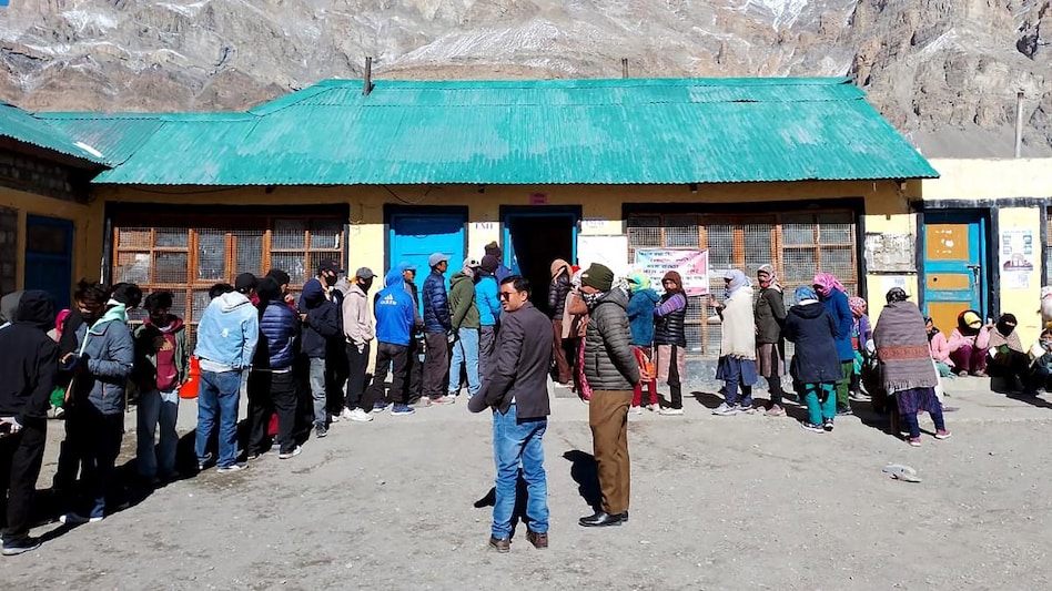 Voters wait in a queue to cast their votes for the Himachal Pradesh Assembly elections Voters wait in a queue to cast their votes for the Himachal Pradesh Assembly elections