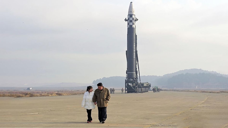 Kim Jong Un with his daughter at a missile launch site Kim Jong Un with his daughter at a missile launch site