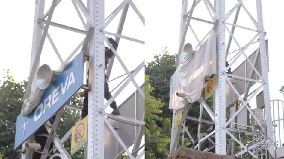 The Morbi administration covered the board of Oreva hanging on one of the towers. The Morbi administration covered the board of Oreva hanging on one of the towers.