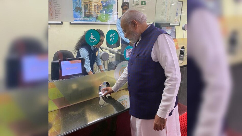 PM Modi purchases ticket to board Nagpur Metro; see pics PM Modi purchases ticket to board Nagpur Metro; see pics