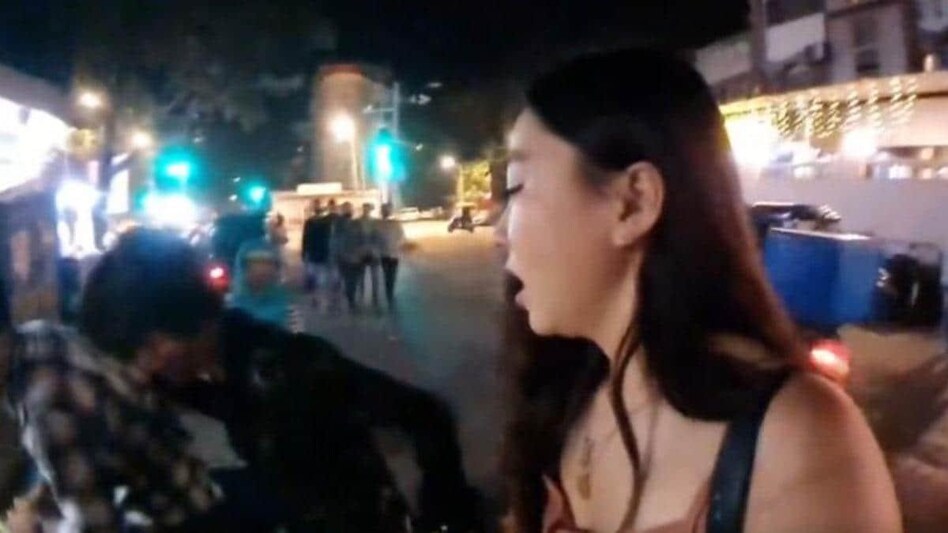 A Twitter handle which had shared the video claimed the woman was from South Korea and was livestreaming in suburban Khar when the incident took place on Tuesday. A Twitter handle which had shared the video claimed the woman was from South Korea and was livestreaming in suburban Khar when the incident took place on Tuesday.