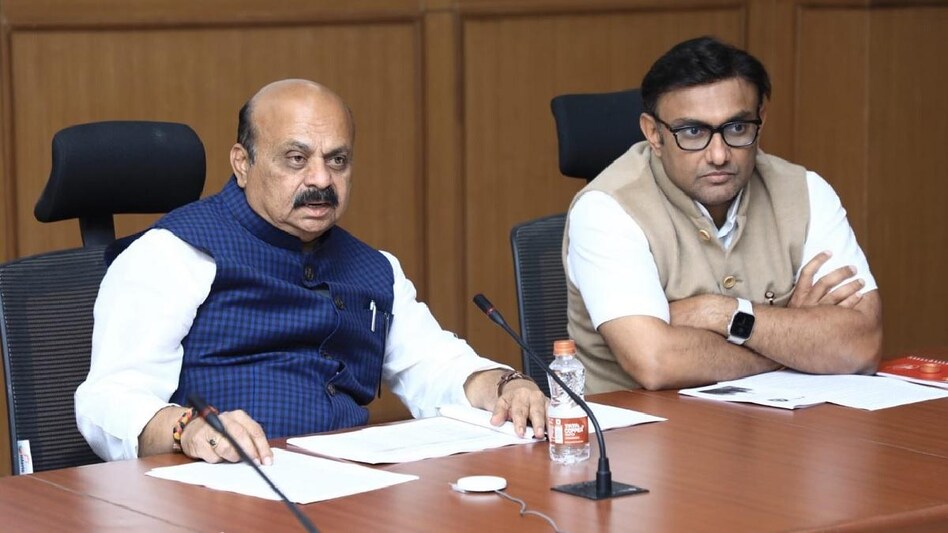 Karnataka Health Minister Dr K Sudhakar with Chief Minister Basavaraj Bommai at a high-level meeting to take stock of the Covid-19 situation Karnataka Health Minister Dr K Sudhakar with Chief Minister Basavaraj Bommai at a high-level meeting to take stock of the Covid-19 situation