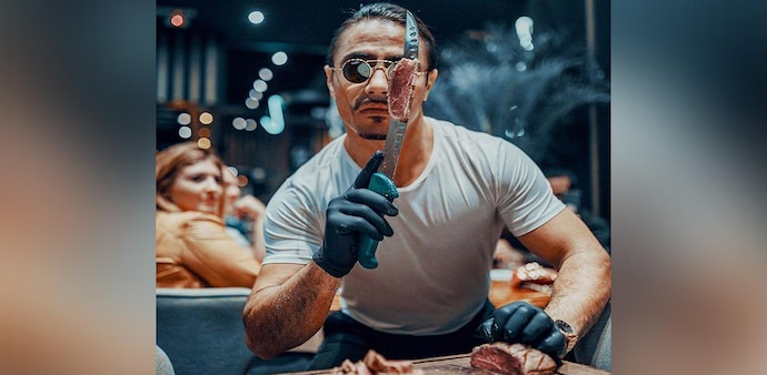 Instagram celebrity chef Salt Bae managed to enter the pitch and got up close and personal with the Argentine players during the celebrations. (Photo: TWITTER) Instagram celebrity chef Salt Bae managed to enter the pitch and got up close and personal with the Argentine players during the celebrations. (Photo: TWITTER)