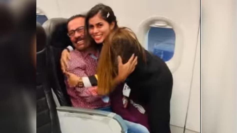 In a viral video, a female pilot can be seen touching her father's feet and hugging him before taking off (Image taken from Instagram) In a viral video, a female pilot can be seen touching her father's feet and hugging him before taking off (Image taken from Instagram)