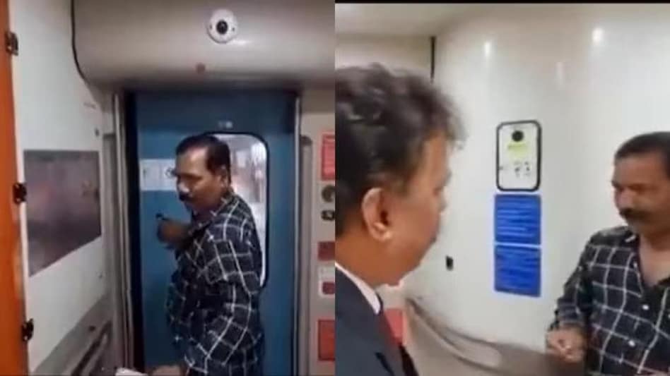 This man entered the train, and while taking pictures, the automatic doors closed This man entered the train, and while taking pictures, the automatic doors closed