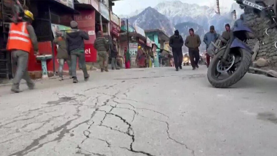 CBRI team, which was sent for an inspection of cracks that have appeared on the Badrinath highway, has stated that the cracks were caused by the local settlement of the road,” Himanshu Khurana, DM, Chamoli, told ANI (Image from ANI) CBRI team, which was sent for an inspection of cracks that have appeared on the Badrinath highway, has stated that the cracks were caused by the local settlement of the road,” Himanshu Khurana, DM, Chamoli, told ANI (Image from ANI)