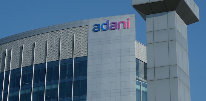 Adani Power hit its 5 per cent lower circuit limit at Rs 148.30. Adani Transmission fell 5 per cent to Rs 1,070.55. Adani Green Energy also declined 5 per cent to Rs 653.40. Adani Power hit its 5 per cent lower circuit limit at Rs 148.30. Adani Transmission fell 5 per cent to Rs 1,070.55. Adani Green Energy also declined 5 per cent to Rs 653.40.