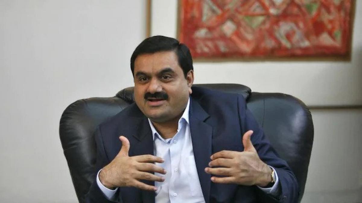 India's Adani tries to calm investors as regulator confirms probe