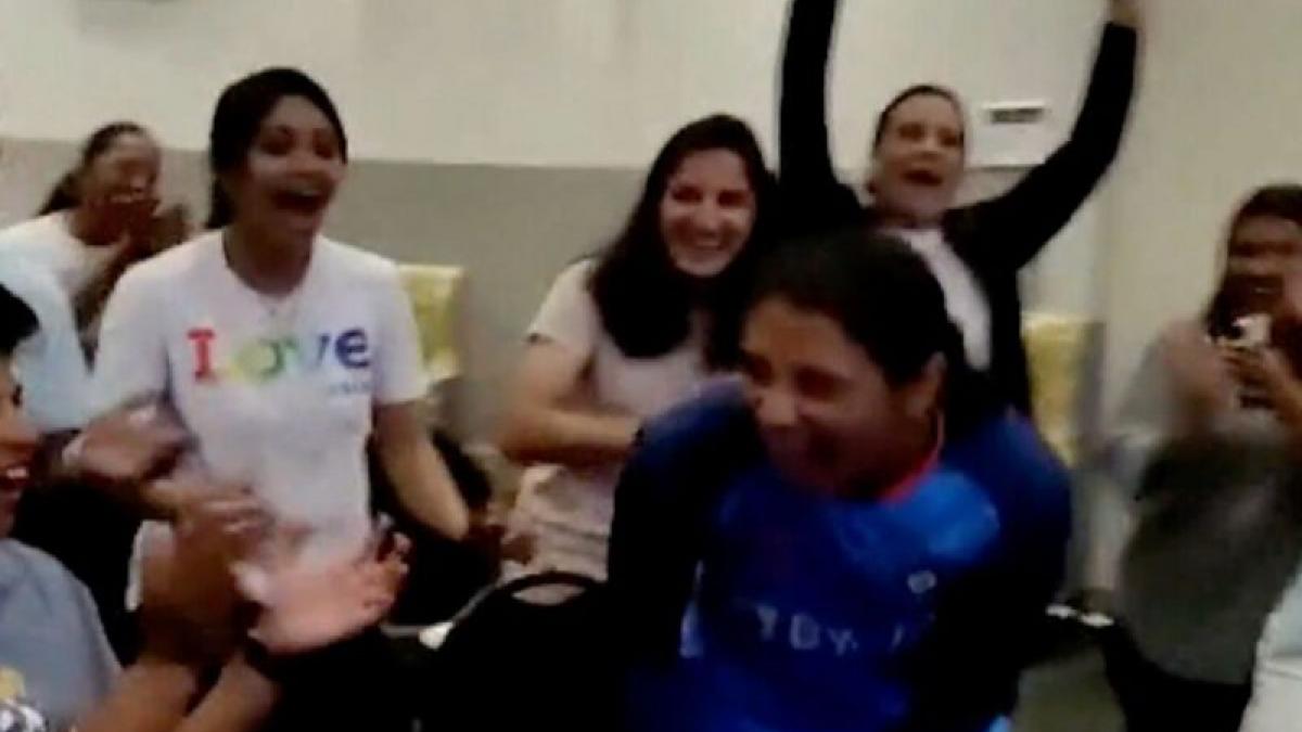 Along with the rest of her teammates from India, she watched a bidding war develop on a large screen. Along with the rest of her teammates from India, she watched a bidding war develop on a large screen.