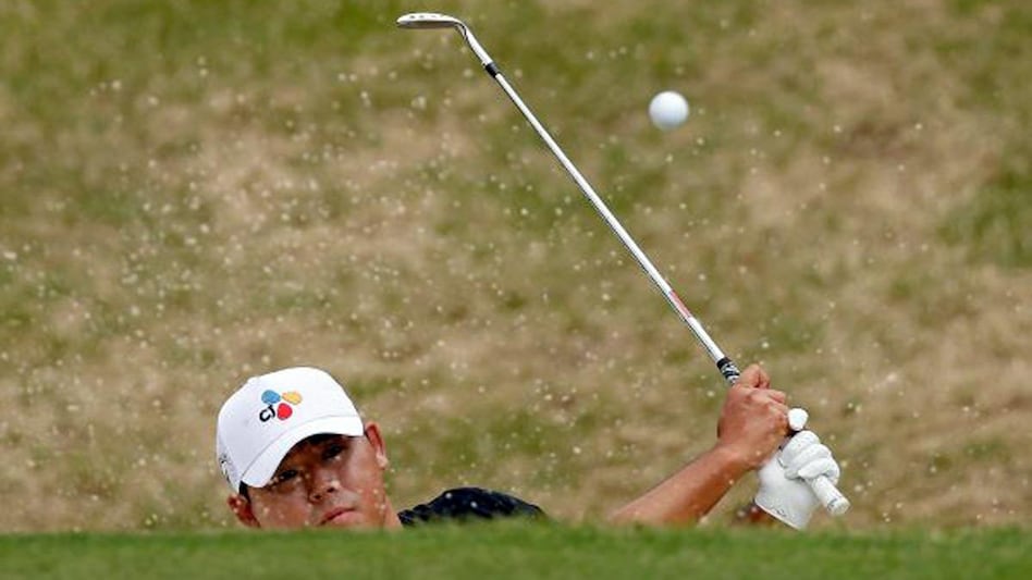 Si Woo Kim blasts out of the bunker in his match against Viktor Hovland at the WGC-Dell Technologies Match Play in Austin, Texas, on Thursday. Image courtesy PGA Tour/ Getty Images Si Woo Kim blasts out of the bunker in his match against Viktor Hovland at the WGC-Dell Technologies Match Play in Austin, Texas, on Thursday. Image courtesy PGA Tour/ Getty Images