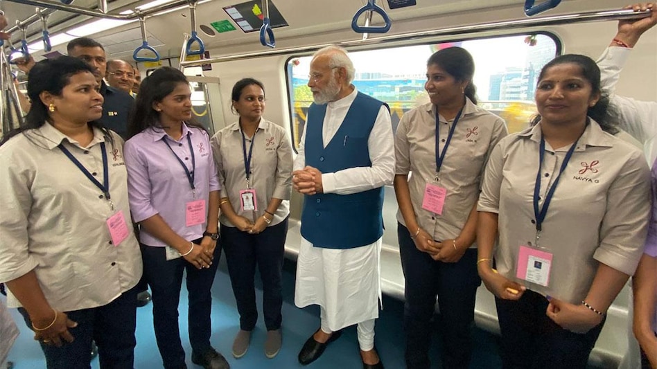 Prime Minister's Office tweeted, “PM Narendra Modi is on board the Bengaluru Metro, interacting with people from different walks of life.” Prime Minister's Office tweeted, “PM Narendra Modi is on board the Bengaluru Metro, interacting with people from different walks of life.”