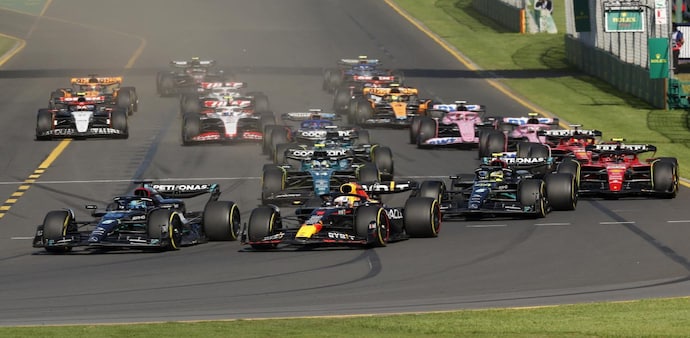 Formula One F1 - Australian Grand Prix - Melbourne Grand Prix Circuit, Melbourne, Australia - April 2, 2023 Red Bull's Max Verstappen and Mercedes' George Russell in action at the start of the race Formula One F1 - Australian Grand Prix - Melbourne Grand Prix Circuit, Melbourne, Australia - April 2, 2023 Red Bull's Max Verstappen and Mercedes' George Russell in action at the start of the race