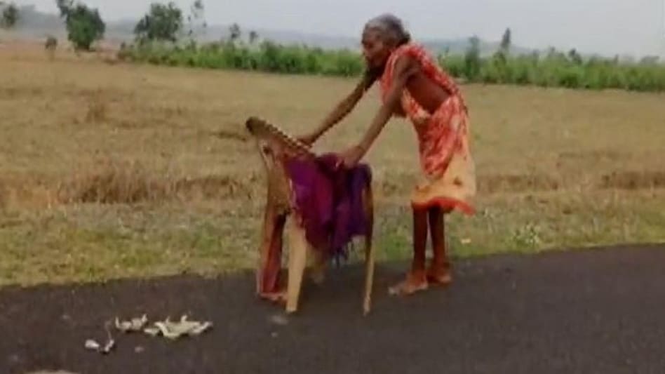 The elderly woman in the video has been identified as Surya Harijan. The elderly woman in the video has been identified as Surya Harijan.