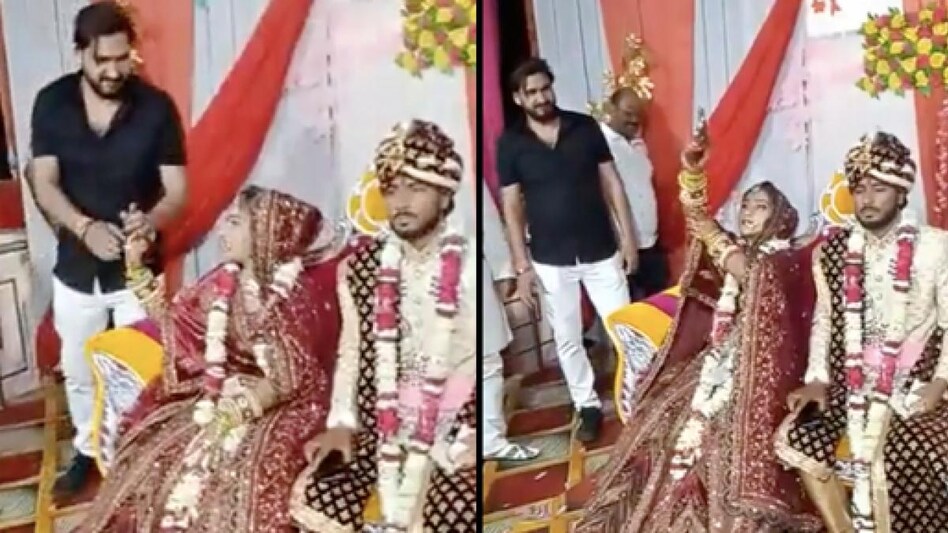 Bride fires in the air during her wedding Bride fires in the air during her wedding