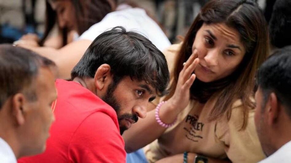 Wrestlers resumed their protest against WFI in New Delhi on April 23 (PTI Photo) Wrestlers resumed their protest against WFI in New Delhi on April 23 (PTI Photo)