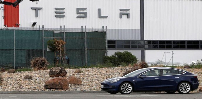 Tesla will have to pay Rs 26.30 crore to its former employee due to a racial harassment case Tesla will have to pay Rs 26.30 crore to its former employee due to a racial harassment case