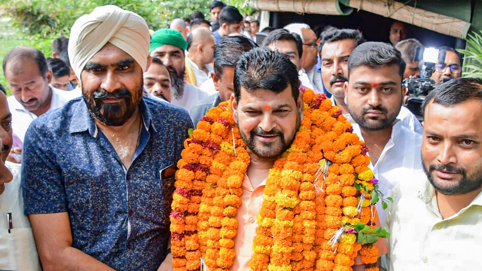Adding to the point, he said that his Lok Sabha membership is not because of "the largesse of Vinesh Phogat (one of the wrestlers leading the protest)" but because of the people who support him (Image PTI) Adding to the point, he said that his Lok Sabha membership is not because of "the largesse of Vinesh Phogat (one of the wrestlers leading the protest)" but because of the people who support him (Image PTI)