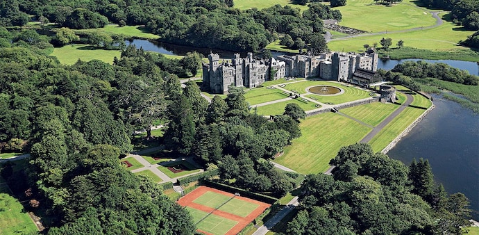 Check into a castle and get transported back to medieval Europe with its moats, turrets, towers and dungeons -- but with modern-day luxury Check into a castle and get transported back to medieval Europe with its moats, turrets, towers and dungeons -- but with modern-day luxury