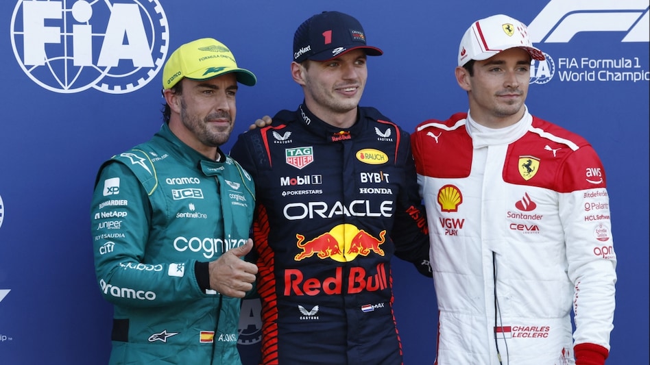 Red Bull's Max Verstappen celebrates after qualifying in pole position alongside second placed Aston Martin's Fernando Alonso and third placed Ferrari's Charles Leclerc Red Bull's Max Verstappen celebrates after qualifying in pole position alongside second placed Aston Martin's Fernando Alonso and third placed Ferrari's Charles Leclerc