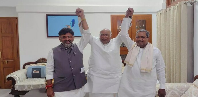 Karnataka leaders Siddaramaiah & DK Shivakumar with Congress Chief Mallikarjun Kharge on Thursday Karnataka leaders Siddaramaiah & DK Shivakumar with Congress Chief Mallikarjun Kharge on Thursday
