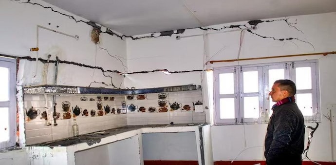 These cracks have appeared in the buildings in the yellow zone, which is right below the red zone area that suffered extreme cracks earlier this year(Image: PTI) These cracks have appeared in the buildings in the yellow zone, which is right below the red zone area that suffered extreme cracks earlier this year(Image: PTI)