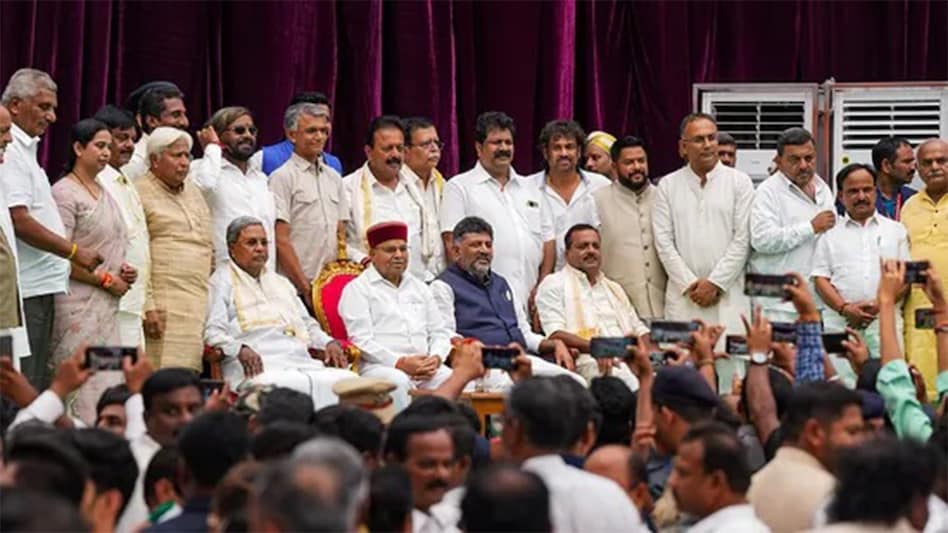 Karnataka CM Siddaramaiah with his newly-inducted cabinet ministers Karnataka CM Siddaramaiah with his newly-inducted cabinet ministers